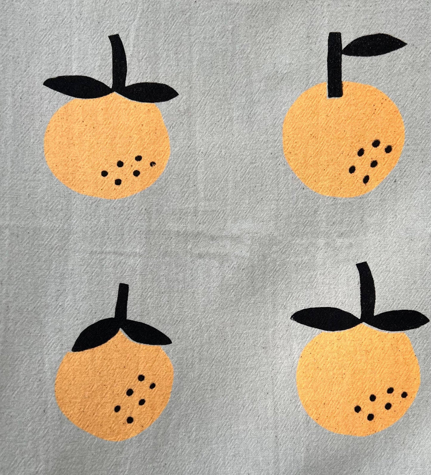 Orange screen printed tea towel