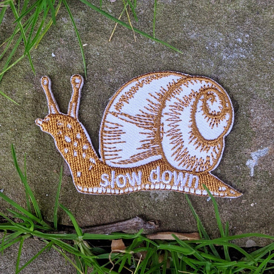 Iron-on patch | slow down snail - brown 1.6" x 2.6"