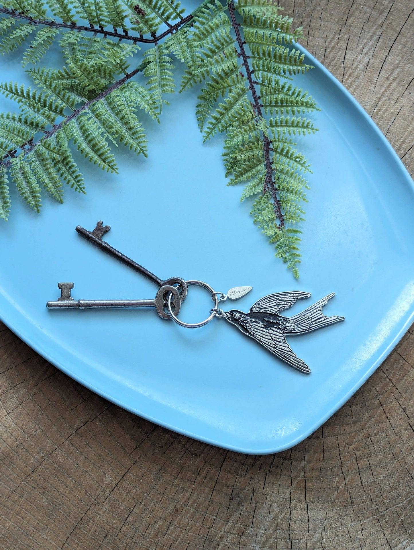 Metal enamel keychain / purse charm | flying black bird