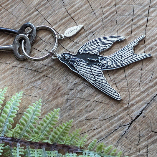 Metal enamel keychain / purse charm | flying black bird