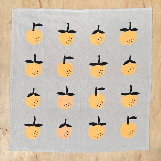Orange screen printed tea towel